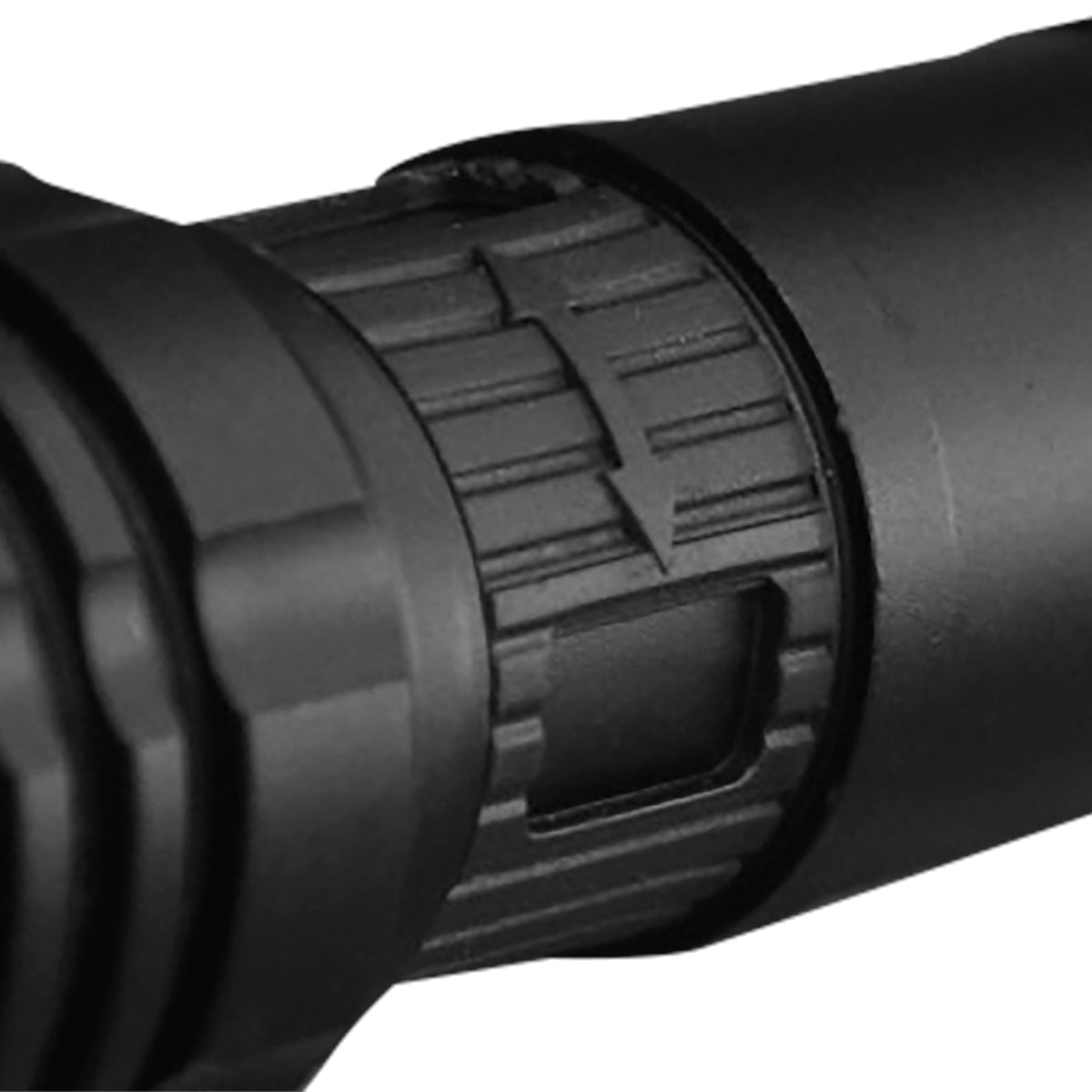 Close-up of a black rifle scope on a white background