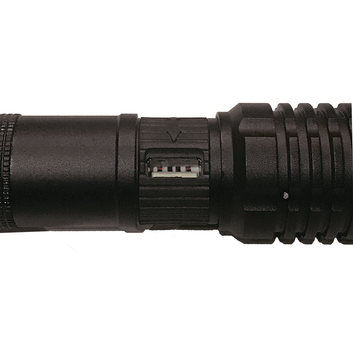 Close-up of a black flashlight on a white background