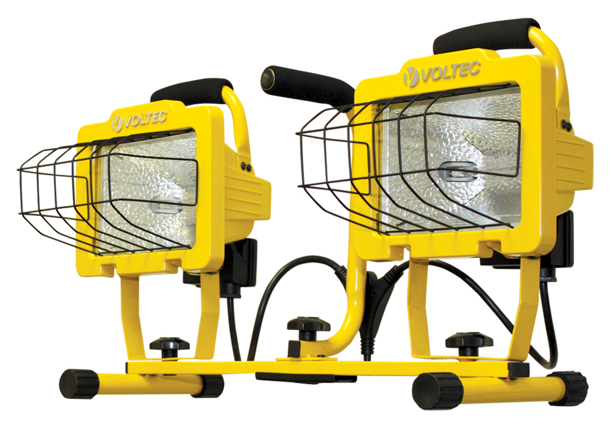 Two yellow VOLTEC work lights on a white background